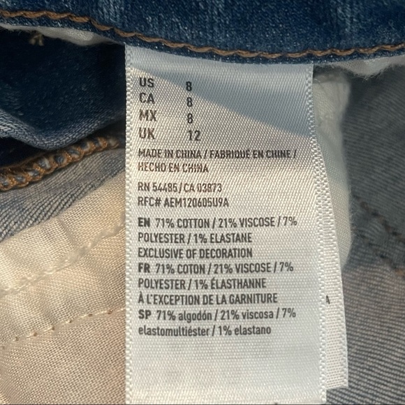 AMERICAN EAGLE Next Level Stretch Hi-Rise Shortie Distressed Blue Jean Shorts - Picture 8 of 9